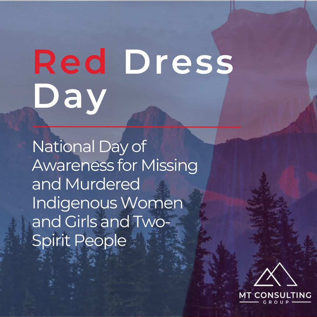 A forested mountain range with pink hues of a sunset is in the background, with a red dress overlaying in the foreground with text reading Red Dress Day, National Day of Awareness for Missing Indigenous Women and girls and two-spirit people